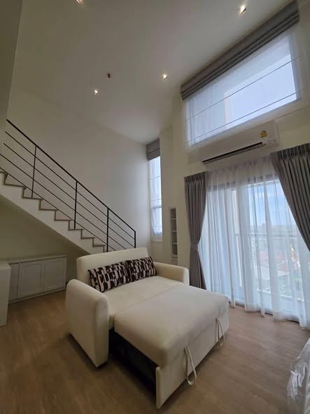 bedroom and living room of Na Reva Charoennakhon
