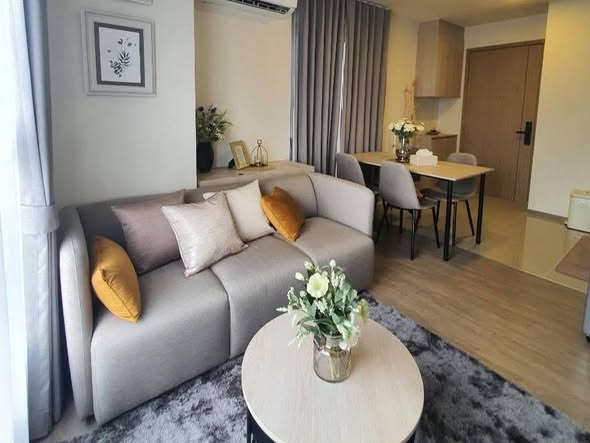 bedroom and living room of NIA by Sansiri