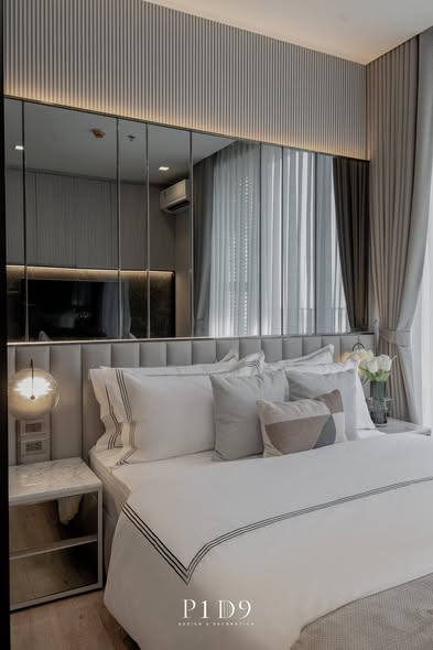 bedroom and bathroom of Noble Around Ari
