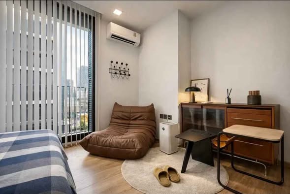 bedroom and living room of Noble Around Ari