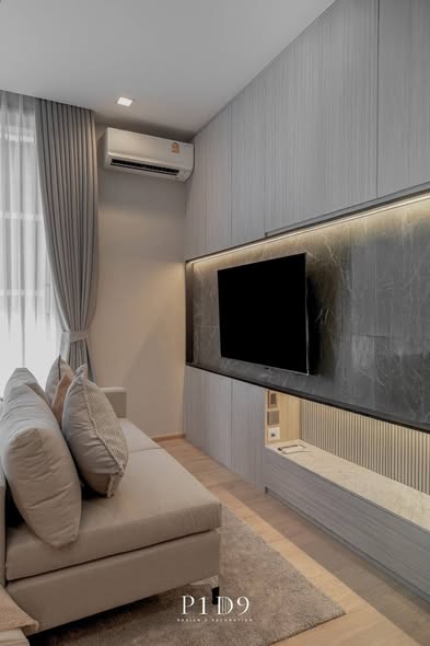 bedroom and living room of Noble Around Ari