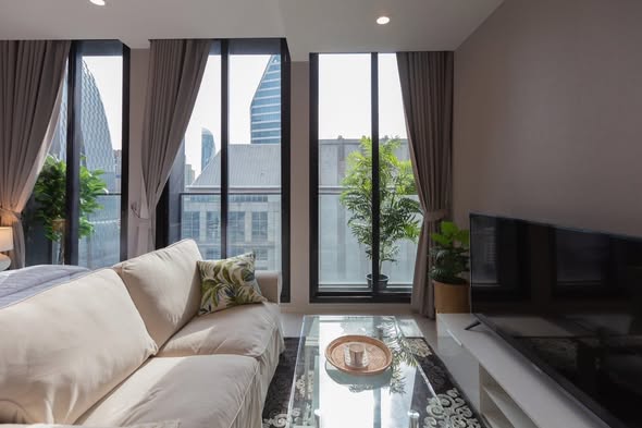 bedroom and living room of Noble Ploenchit