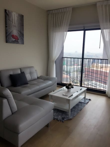 bedroom and living room of Noble Reveal