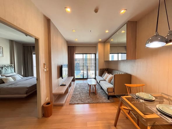 bedroom and living room of Noble Reveal