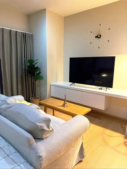 bedroom and living room of Noble Reveal
