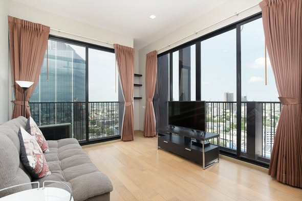 living room and bedroom of Noble Reveal