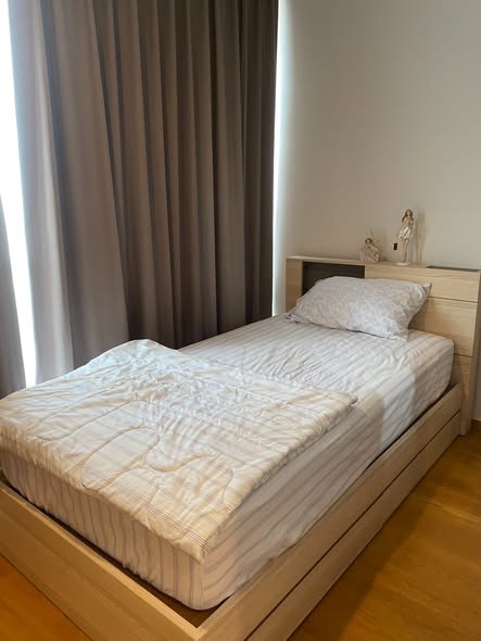 bedroom of Noble Revo Silom