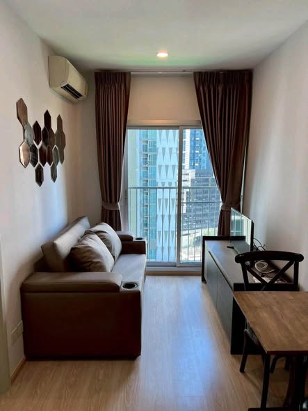 living room and bedroom of Noble Revolve Ratchada 1