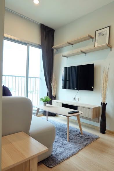 living room and bedroom of Noble Revolve Ratchada 1
