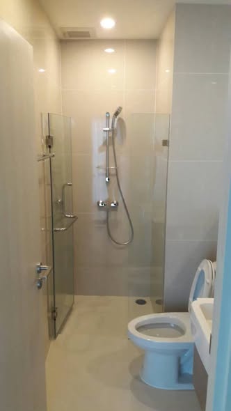 room interior and bathroom of Noble Revolve Ratchada 1
