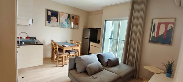 bedroom and living room of Noble Revolve Ratchada 2