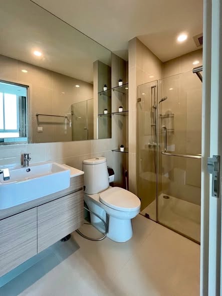 room interior and bathroom of Noble Revolve Ratchada 2