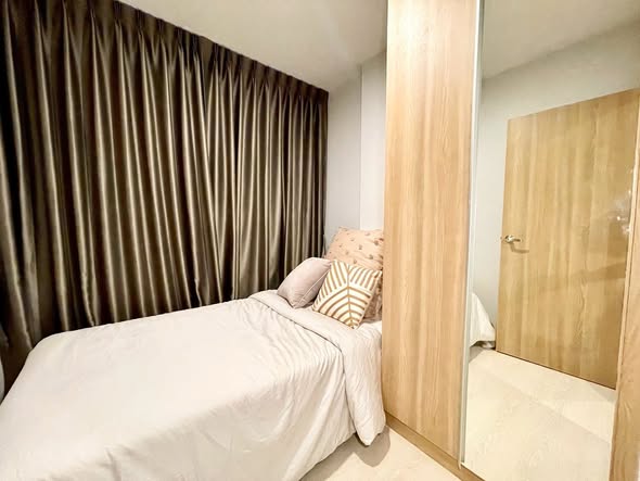 bedroom and room interior of Nue Connex Don Mueang