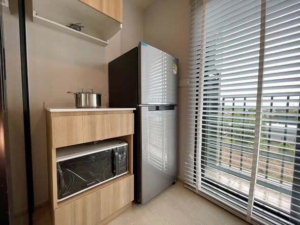 room interior and kitchen of Nue Connex Don Mueang