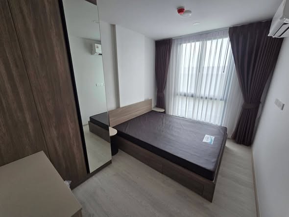 bedroom of Nue Cross Khu Khot Station (นิว ครอส คูคต สเตชัน)
