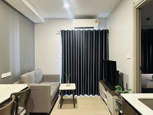 living room and bedroom of Nue Cross Khu Khot Station (นิว ครอส คูคต สเตชัน)