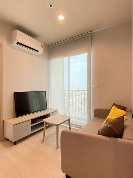 living room and room interior of Nue Mega Plus Bangna