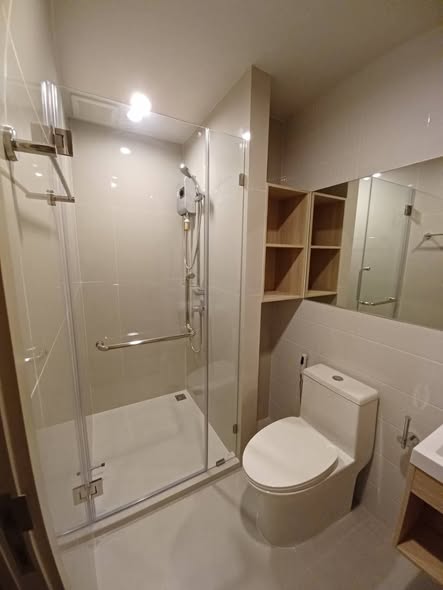 room interior and bathroom of Nue Mega Plus Bangna