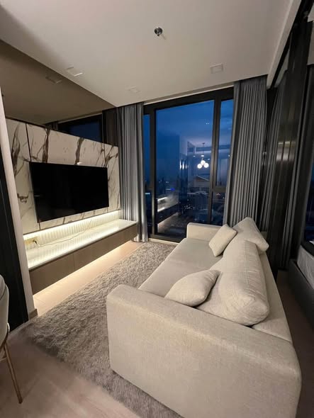 bedroom and living room of One9Five Asoke – Rama 9