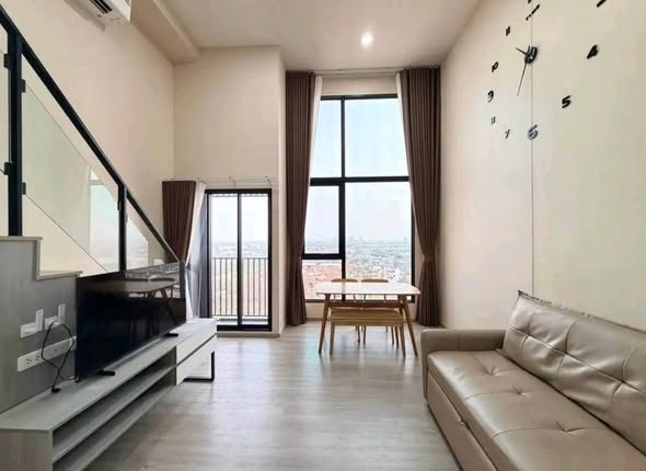 bedroom and living room of Origin Plug & Play Nonthaburi Station