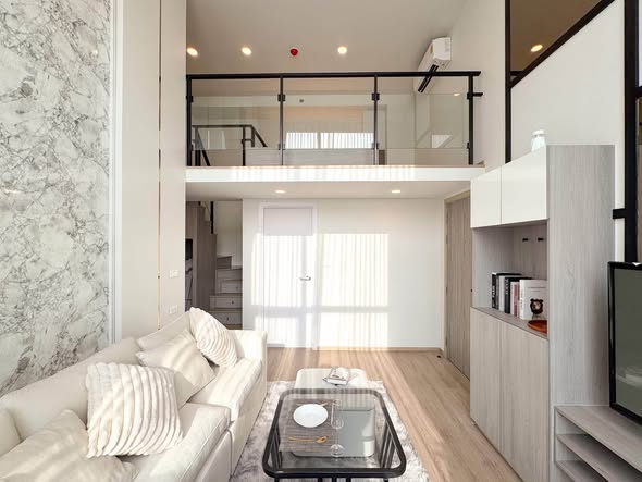 living room of Origin Plug & Play Nonthaburi Station