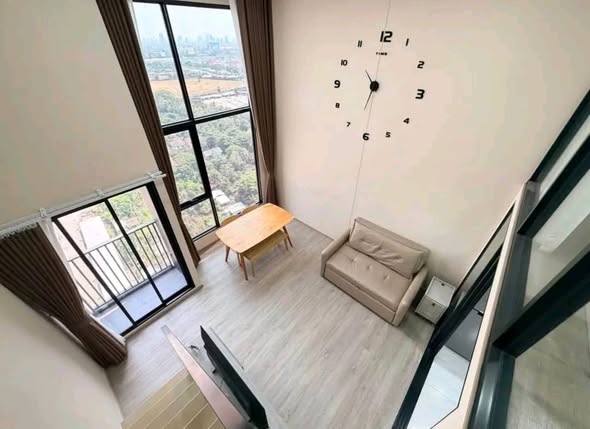 living room of Origin Plug & Play Nonthaburi Station