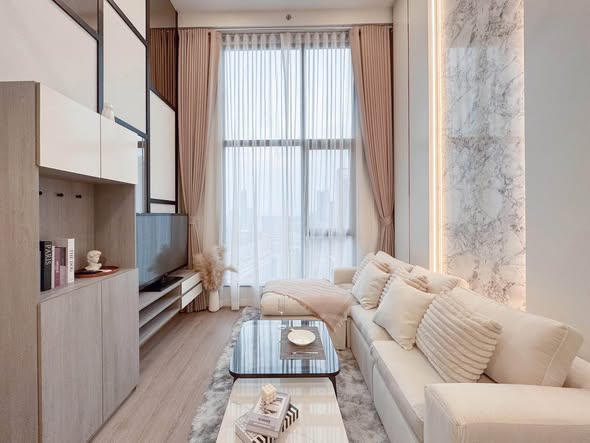 living room and bedroom of Origin Plug & Play Nonthaburi Station