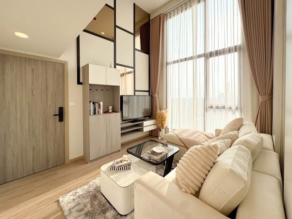 living room and bedroom of Origin Plug & Play Nonthaburi Station