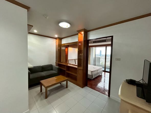 bedroom of P. S. T. City Home