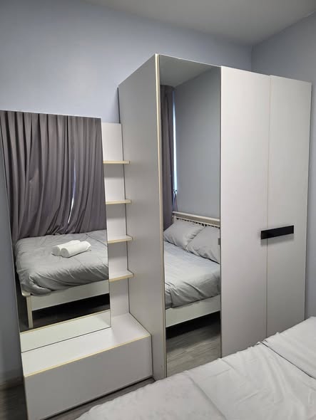 bedroom and room interior of Pano Ville Condominium