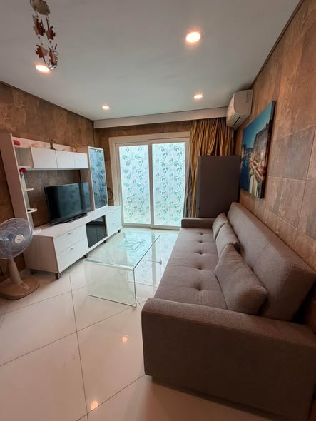bedroom and living room of Park Lane Condominium and Resort
