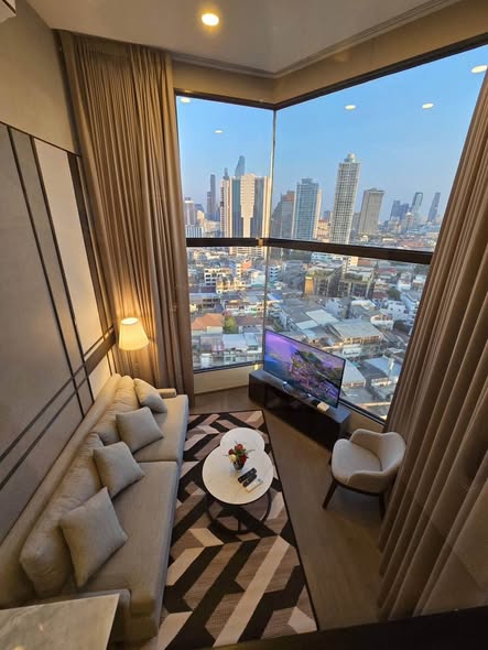 bedroom and living room of Park Origin Chula-Sam Yan