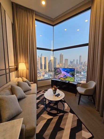 living room and bedroom of Park Origin Chula-Sam Yan