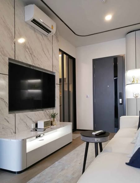 bedroom and living room of Park​ Origin​ Phaya Thai
