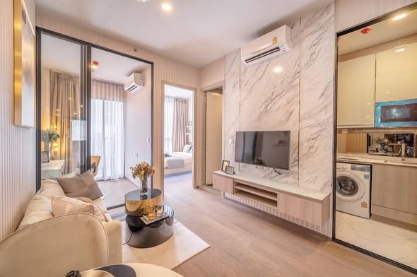 living room and bedroom of Park​ Origin​ Phaya Thai