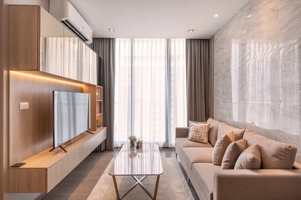 living room and bathroom of Park Origin Phrom Phong