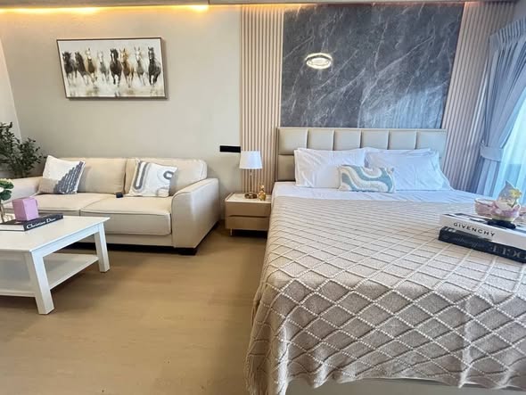 bedroom and living room of Pattaya Plaza Condotel