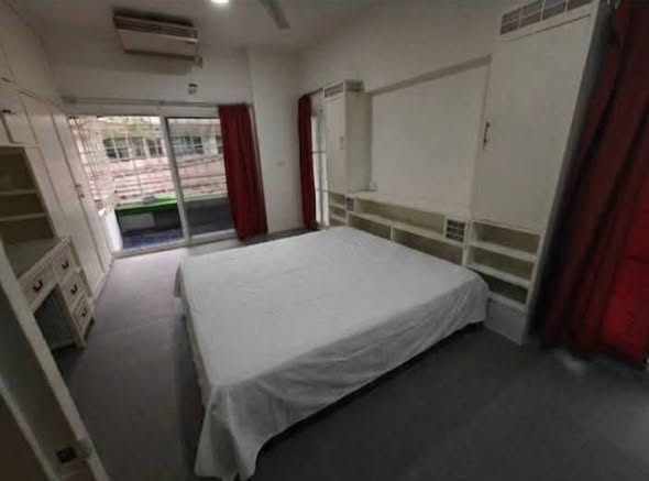 bedroom of Penthouse Bar + Grill