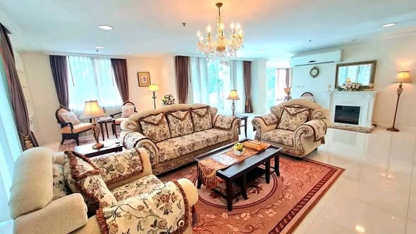 living room and bedroom of Piyathip Place Serviced Apartment