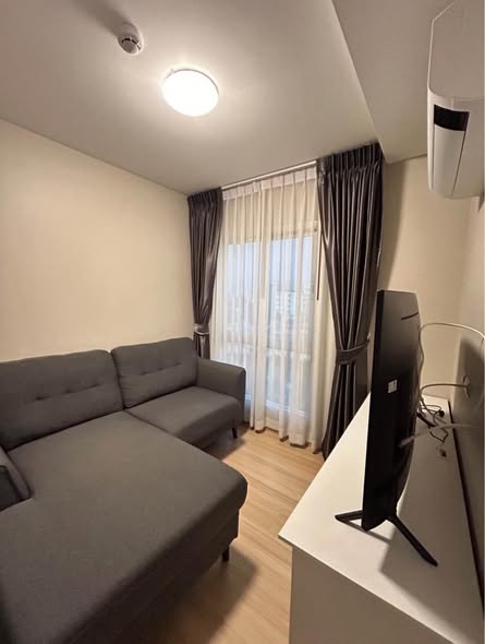 bedroom and living room of PLUM CONDO CHAENGWATTANA STATION พลัม คอนโด แจ้งวัฒนะ สเตชั่น