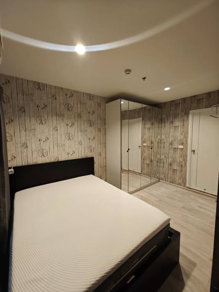 bedroom of Plum Condo Ramkhamheng Station