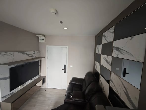 living room and kitchen of Plum Condo Ramkhamheng Station
