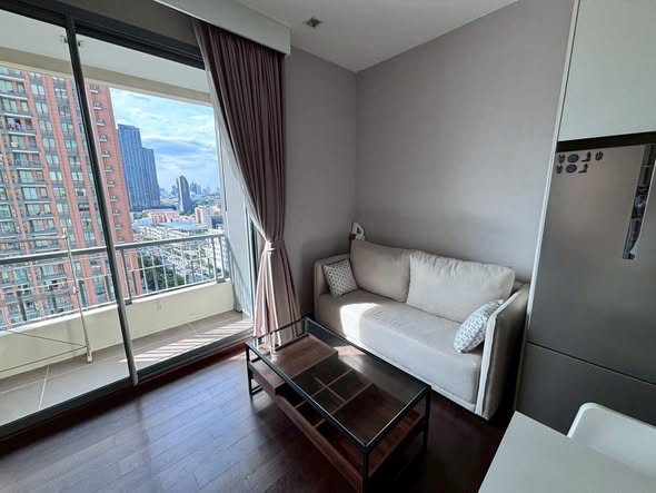 bedroom and living room of Q Asoke