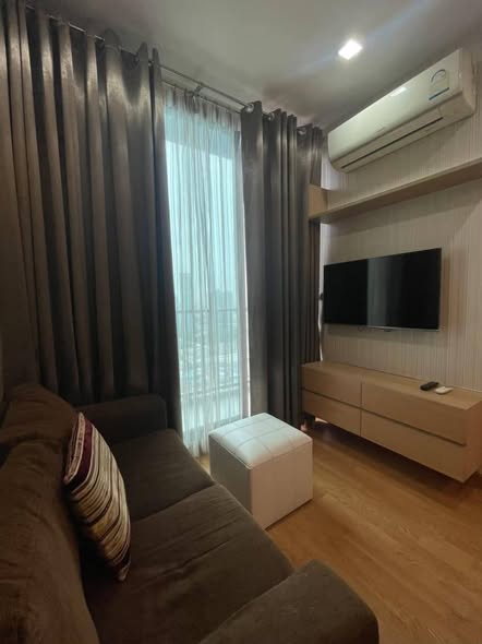 bedroom and living room of Q House Sukhumvit 79