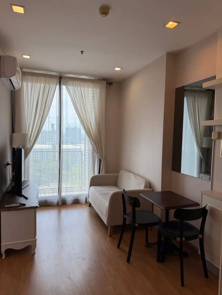 living room and bedroom of Q House Sukhumvit 79