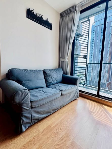 living room and bedroom of Q House Sukhumvit 79