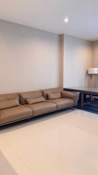 bedroom and living room of Q1 Sukhumvit Condo by Q House