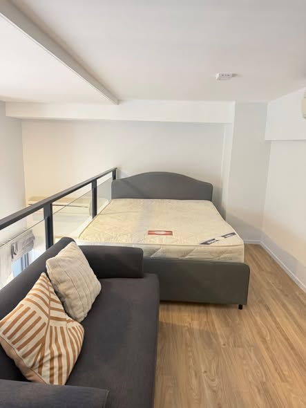 living room and bedroom of Ramada by Wyndham Bangkok Sukhumvit 87