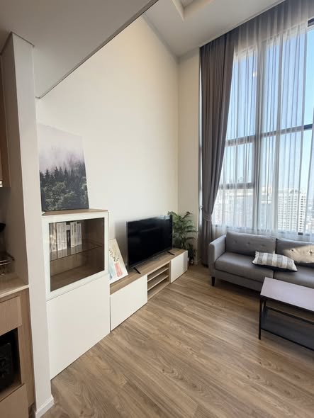 living room and room interior of Ramada Plaza by Wyndham Bangkok Sukhumvit 48