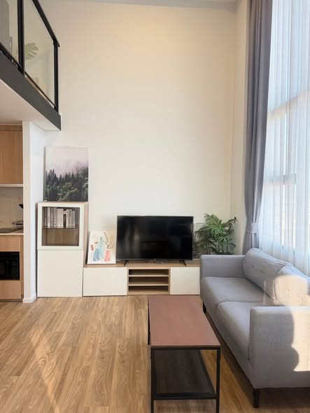 living room and room interior of Ramada Plaza by Wyndham Bangkok Sukhumvit 48